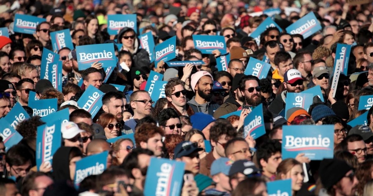 Supporters listen as Vermont Sen. Bernie Sanders speaks during a presidential campaign rally in Chicago's Grant Park on March 7, 2020.