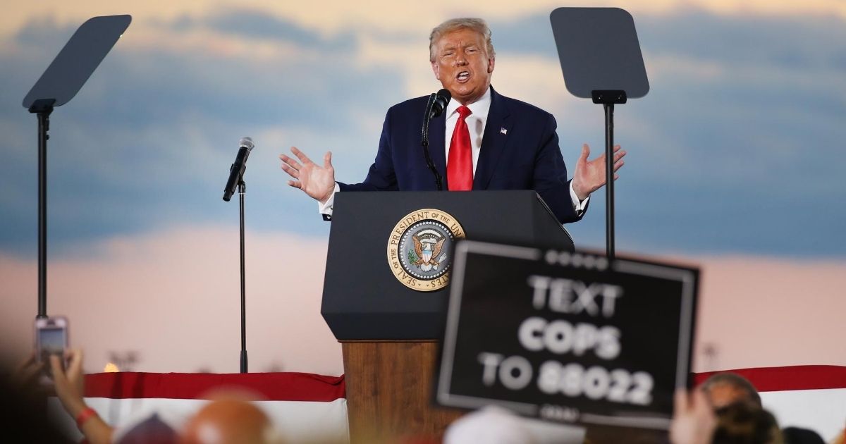 President Donald Trump speaks a rally at an airport hanger in Londonderry, New Hampshire, on Aug. 28, 2020.