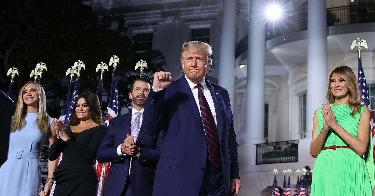 President Donald Trump, center, reacts as he stands with his family members after delivering his acceptance speech for the Republican presidential nomination on the South Lawn of the White House on Aug. 27, 2020, in Washington, D.C.