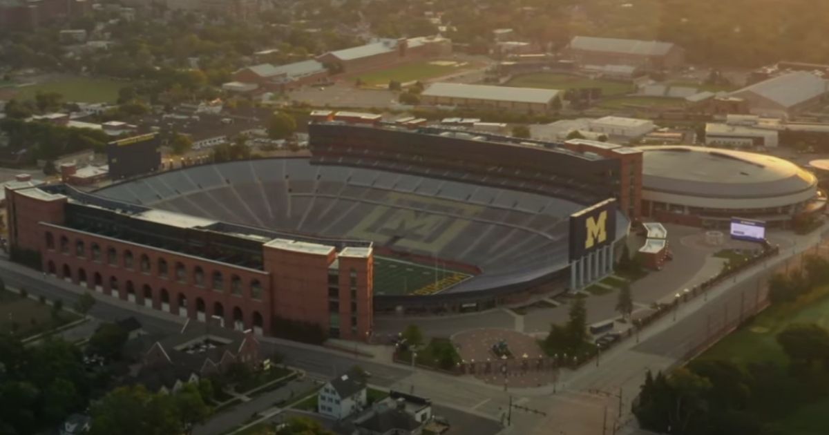 The ad, titled "Anthem :60" and posted to YouTube on Thursday, opens with a voice-over of a man announcing, "Good weather by opening day standard. We're going to be in the 60s, enjoy the game," as footage rolled of large, empty stadiums and shuttered ticket windows.