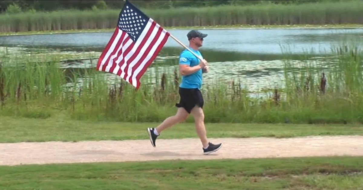 Mark Palmieri, who runs with the stars and stripes to bring hope and awareness of an important issue.