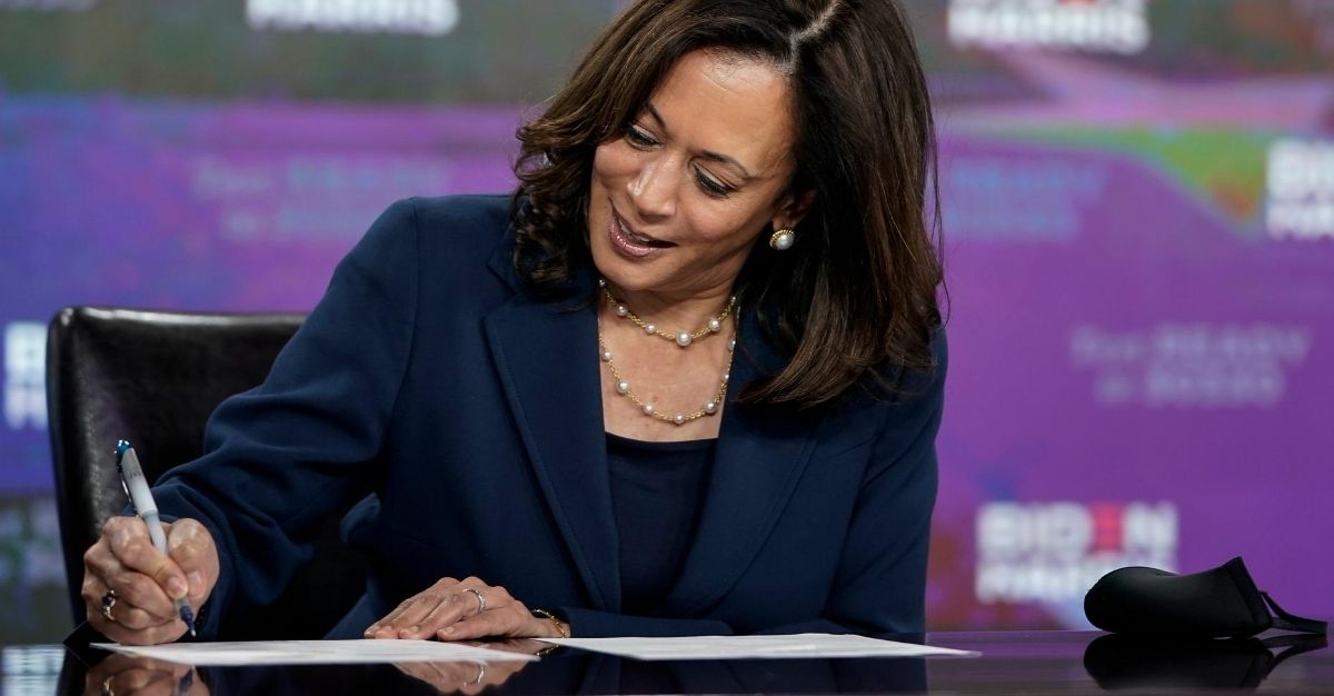 Democratic vice presidential nominee, U.S. Sen. Kamala Harris signs required documents for receiving the Democratic nomination for Vice President of the United States