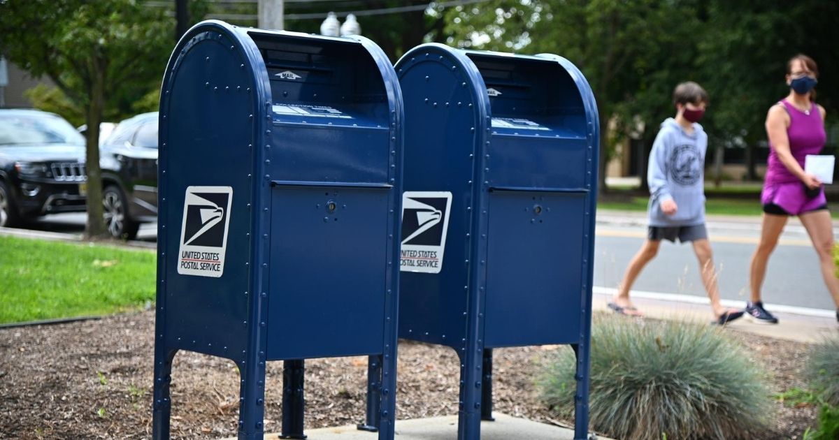 Mailboxes sit outside of a Morris Plains, New Jersey, post office on Aug. 17, 2020.
