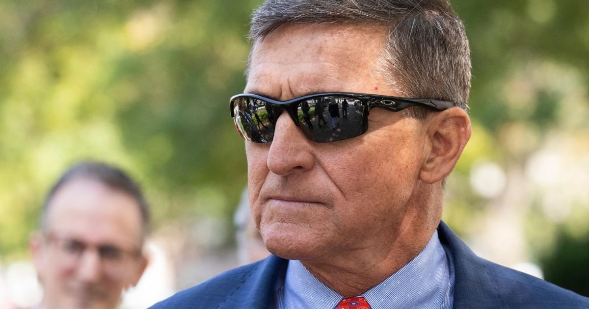Michael Flynn leaves federal court in Washington following a status conference with Judge Emmet Sullivan on Sept. 10, 2019.