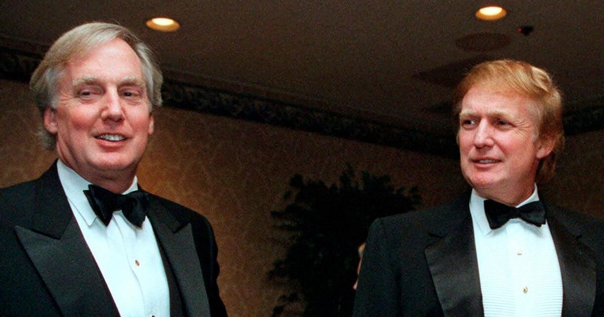 In this Nov. 3, 1999, file photo, Robert Trump, left, joins then real estate developer Donald Trump at an event in New York.