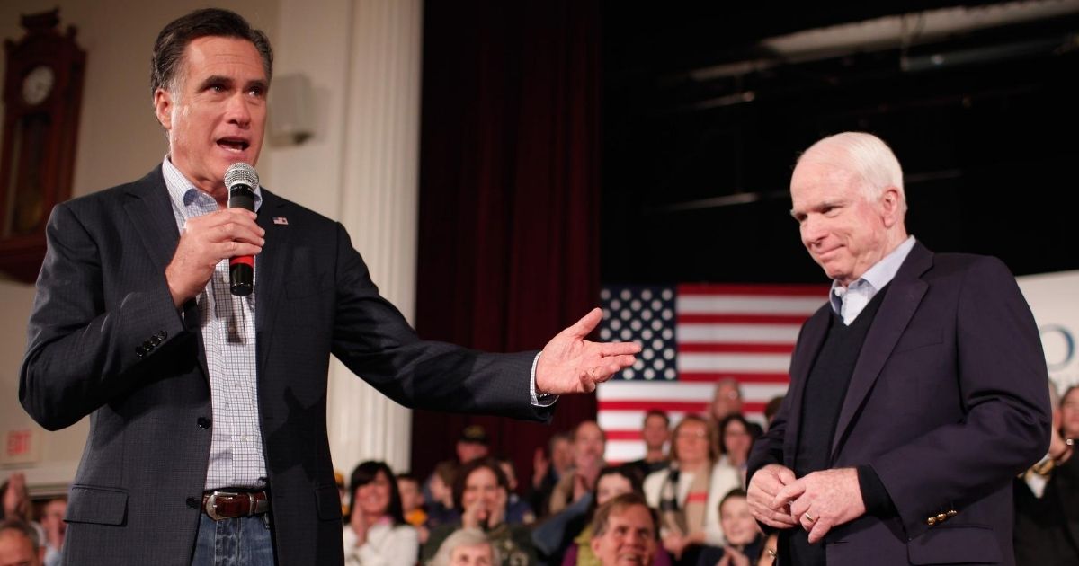 Former Massachusetts Gov. Mitt Romney speaks alongside Sen. John McCain of Arizona at the Peterborough Town House in Peterborough, New Hampshire, on Jan. 4, 2012.