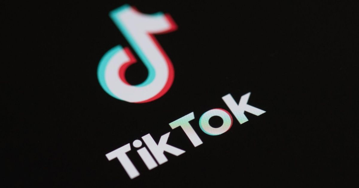 The logo of the social network application Tik Tok is seen on the screen of a phone in Paris on May 27, 2020.