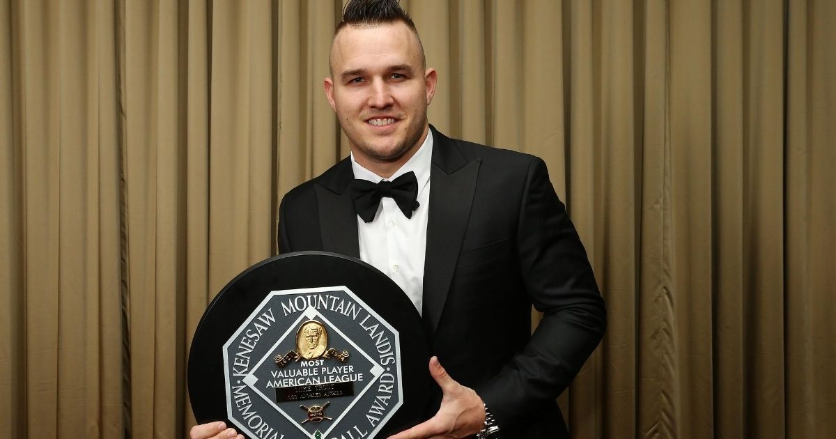 AL MVP Mike Trout of the Los Angeles Angels poses for a photo with the trophy at the 97th annual New York Baseball Writers' Dinner at the Sheraton New York on Jan. 25, 2020.