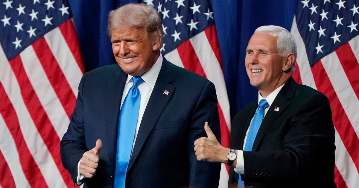 President Donald Trump and Vice President Mike Pence give a thumbs up on the first day of the Republican National Convention at the Charlotte Convention Center in North Carolina on Aug. 24, 2020.