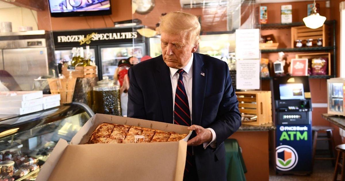 President Donald Trump stops for a pizza at Arcaro and Genell in Old Forge, Pennsylvania, on Aug. 20, 2020.