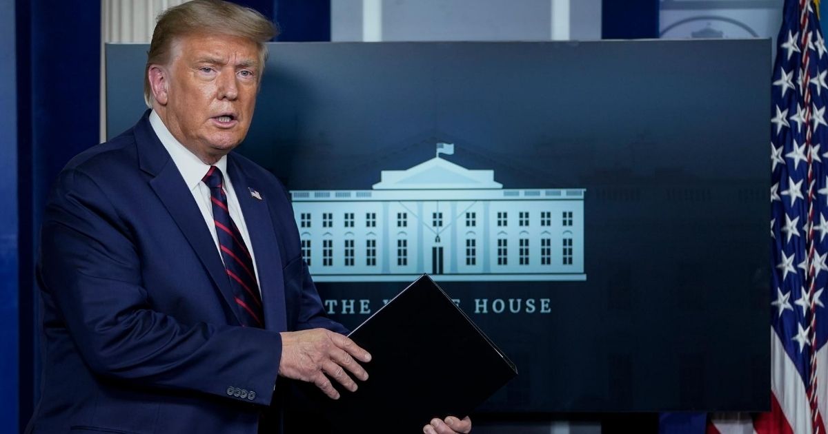 President Donald Trump prepares to speak at an Aug. 4 news briefing at the White House.