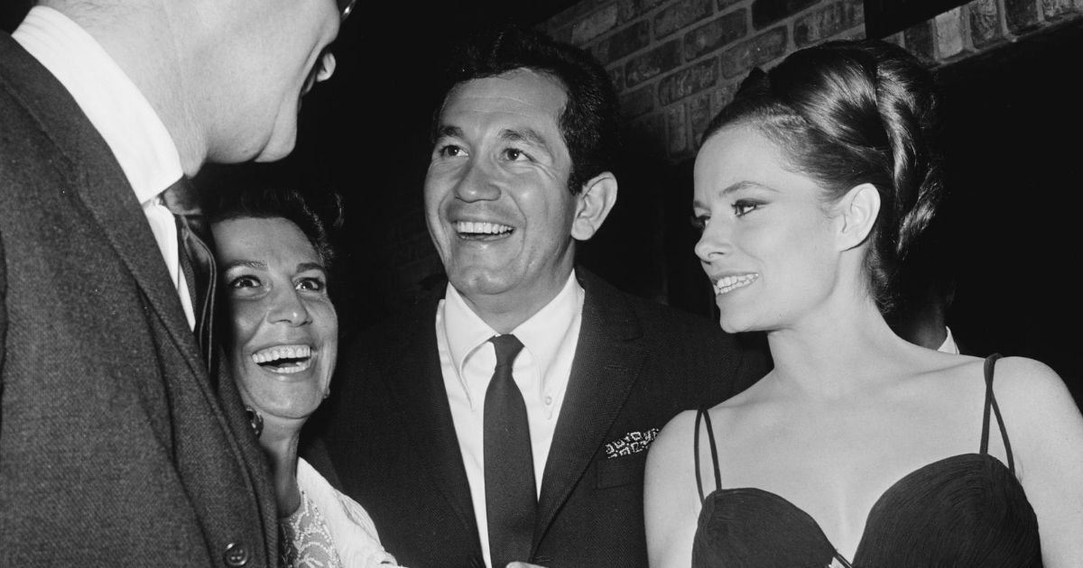 Singer and actor Trini Lopez with singer Nancy Sinatra, left, and actress Luciana Paluzzi, right, in a photo circa 1970.