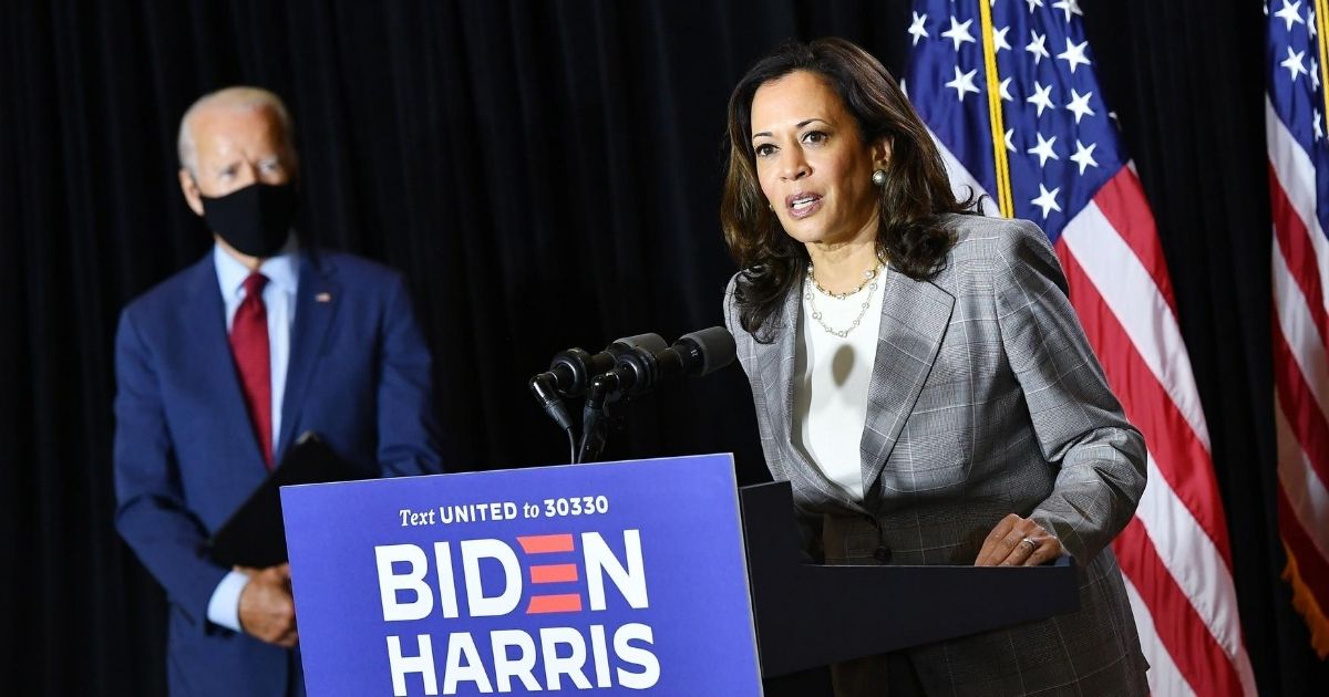 Democratic presidential nominee former Vice President Joe Biden, left, and his running mate, California Sen. Kamala Harris, hold a news conference after receiving a briefing on COVID-19 in Wilmington, Delaware, on Aug. 13, 2020.