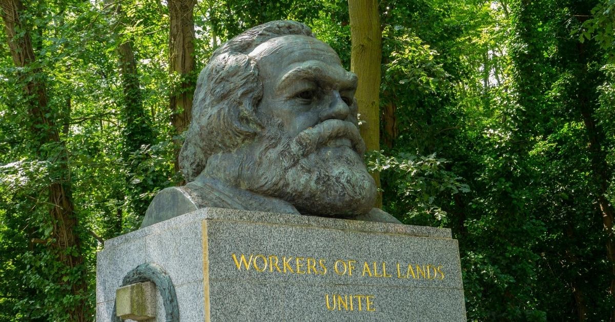 A statue marks the grave of Karl Marx in London's Highgate Cemetery.
