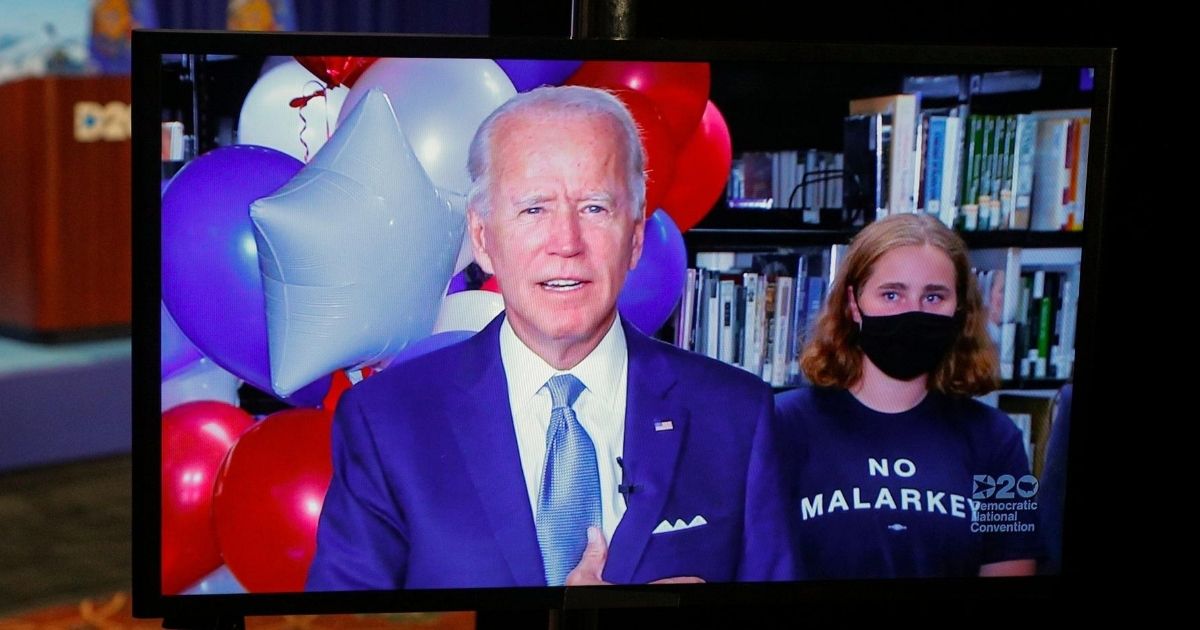 2020 Democratic presidential nominee Joe Biden reacts in a video feed from Delaware during the second night of the virtual 2020 Democratic National Convention on Aug. 18, 2020.