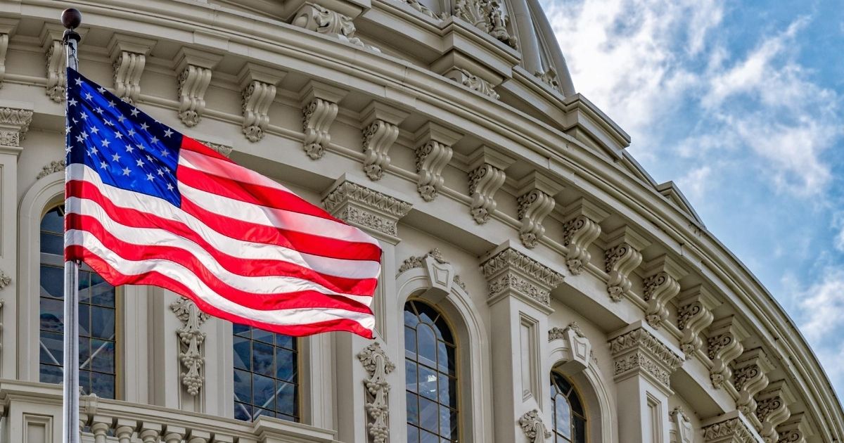An American flag is pictured at the dome of the Capitol in Washington, D.C.