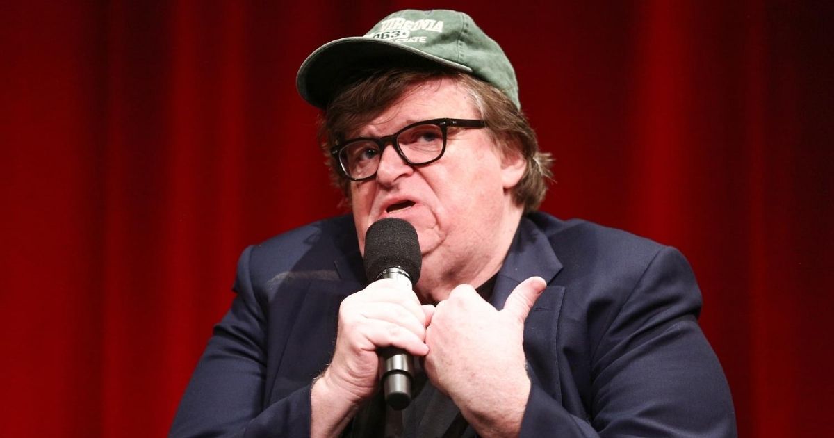 Liberal filmmaker Michael Moore scowls in a 2018 file photo from Beverly Hills.