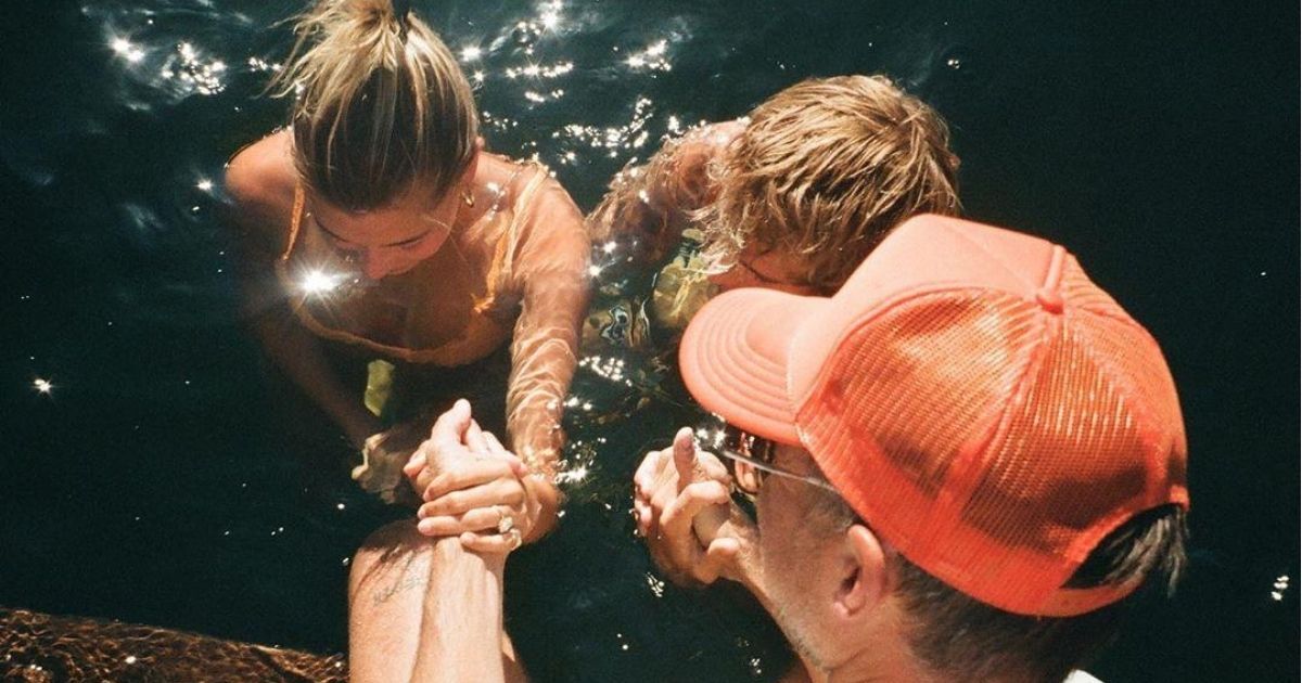 Justin Bieber and his wife, Hailey, are baptized together.