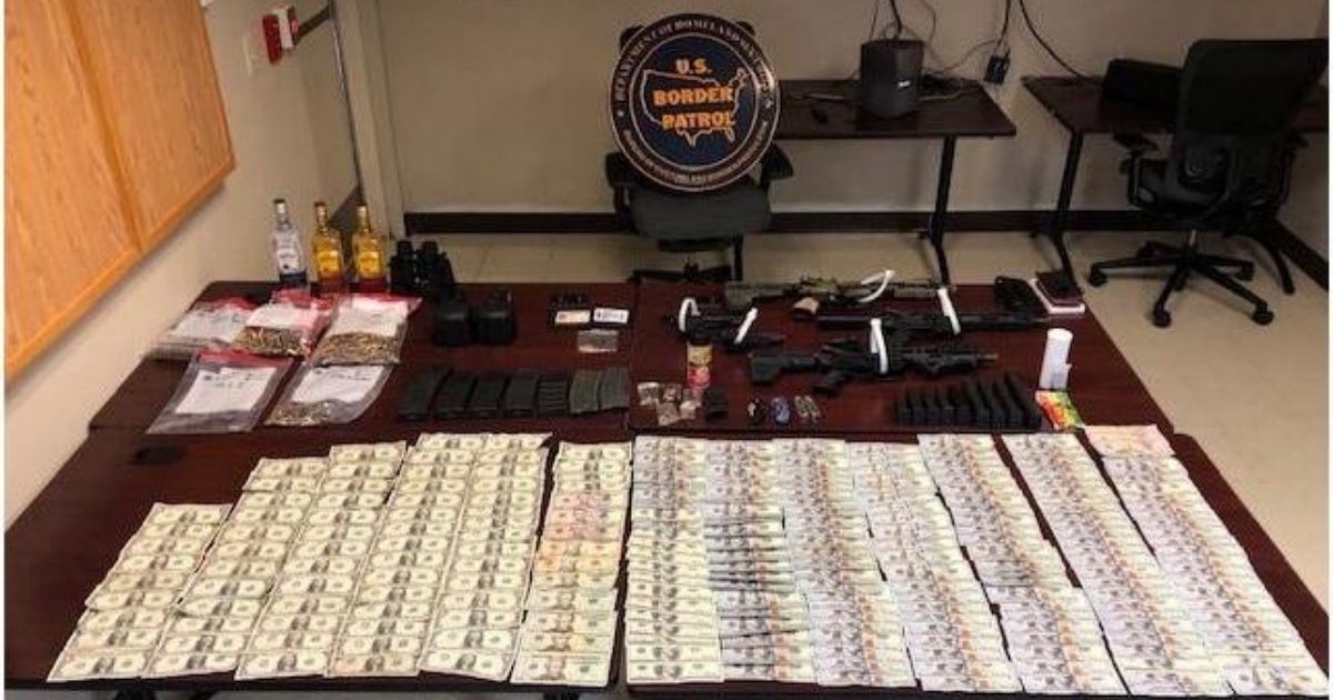 Customs and Border Protection agents seized multiple weapons and $16,000 in cash from two men in a makeshift vessel off the coast of Puerto Rico on Aug. 20, 2020.