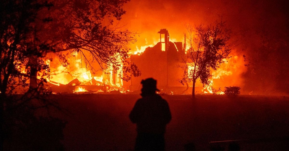 A home burns in Vacaville, California, during the LNU Lightning Fire on Aug. 19, 2020.