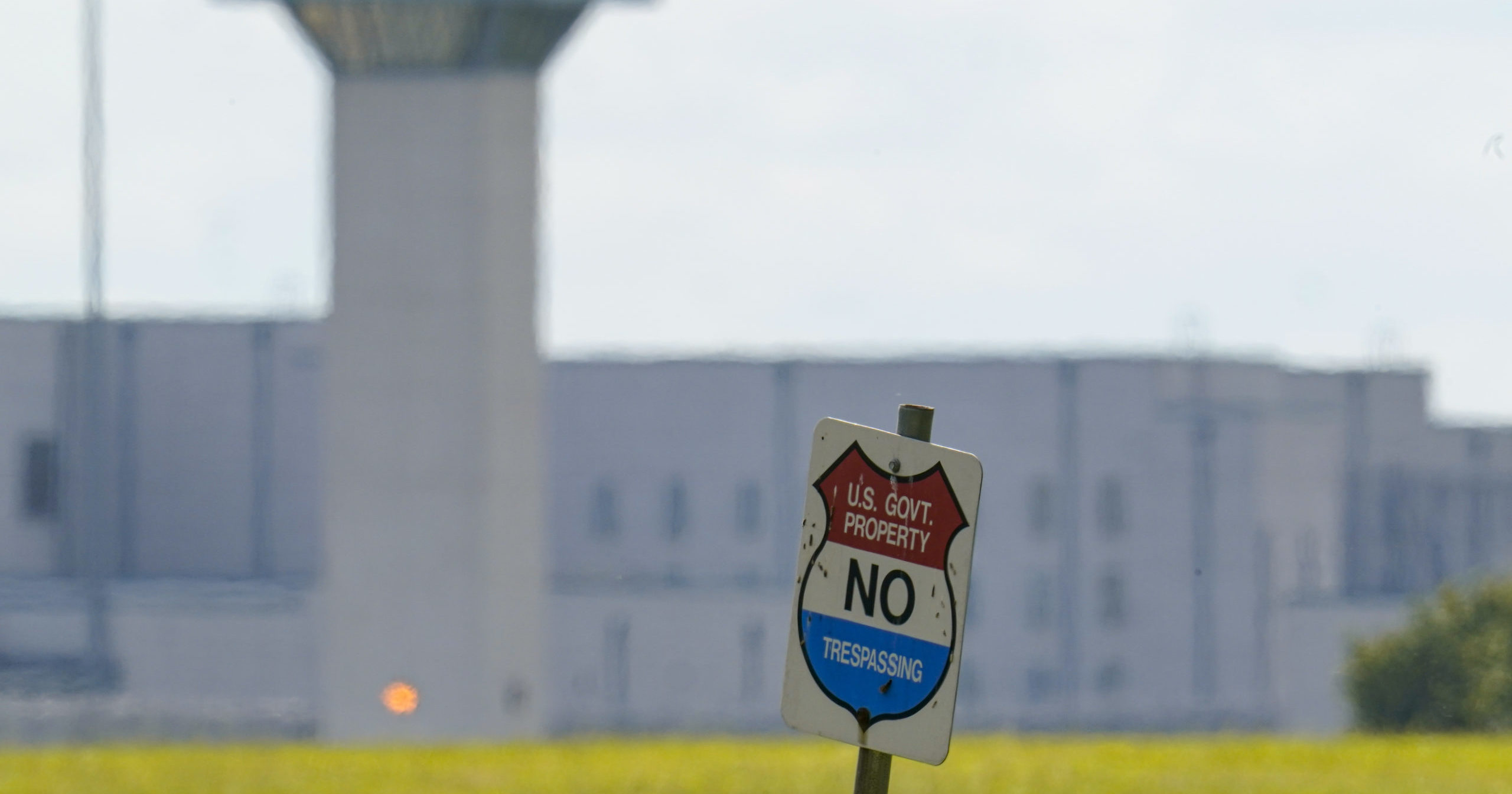A sign stands in front the federal prison complex in Terre Haute, Indiana, on Aug. 26, 2020.