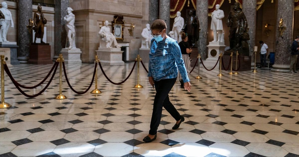 Rep. Karen Bass walks through Statuary Hall in the U.S. Capitol on July 20, 2020, in Washington, D.C.