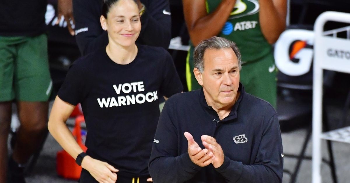 Head coach Gary Kloppenburg and Sue Bird of the Seattle Storm react to a play during the second half of a game against the Connecticut Sun Aug. 4, 2020, in Palmetto, Florida.
