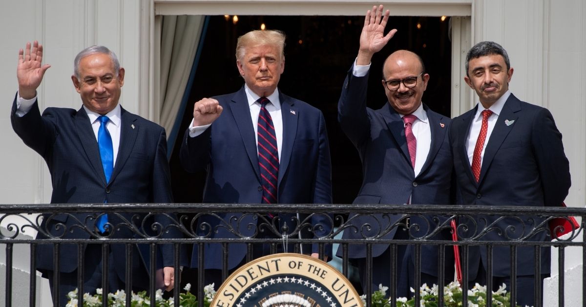 From left to right, Israeli Prime Minister Benjamin Netanyahu, U.S. President Donald Trump, Bahrain Foreign Minister Abdullatif al-Zayani and UAE Foreign Minister Abdullah bin Zayed Al-Nahyan wave from the Truman Balcony at the White House after they participated in the signing of the Abraham Accords in Washington, D.C., on Sept. 15, 2020.