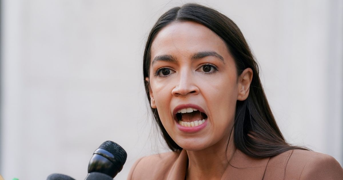 New York Democratic Rep. Alexandria Ocasio-Cortez speaks during a news conference outside the United States Postal Service Jamaica station on Aug. 18, 2020, in the Queens borough of New York.