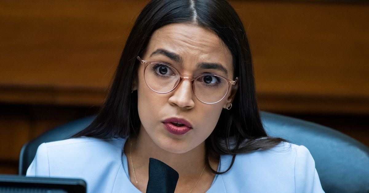 New York Democratic Rep. Alexandria Ocasio-Cortez questions Postmaster General Louis DeJoy during a House Oversight and Reform Committee hearing on the Postal Service on Capitol Hill on Aug. 24, 2020, in Washington.