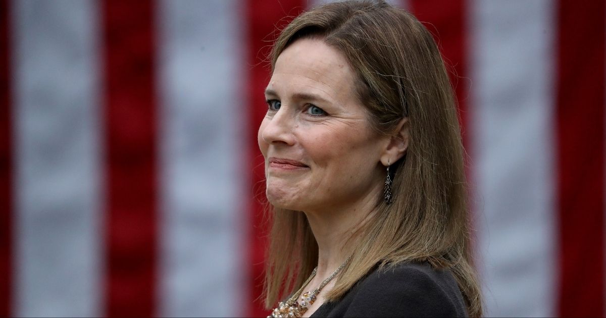 Judge Amy Coney Barrett is introduced by President Donald Trump as his nominee to the Supreme Court on Saturday.
