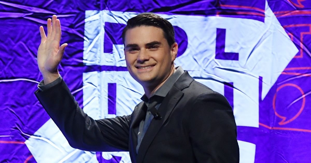 Conservative political commentator Ben Shapiro waves to the crowd as he arrives to speak at the 2018 Politicon in Los Angeles on Oct. 21, 2018.