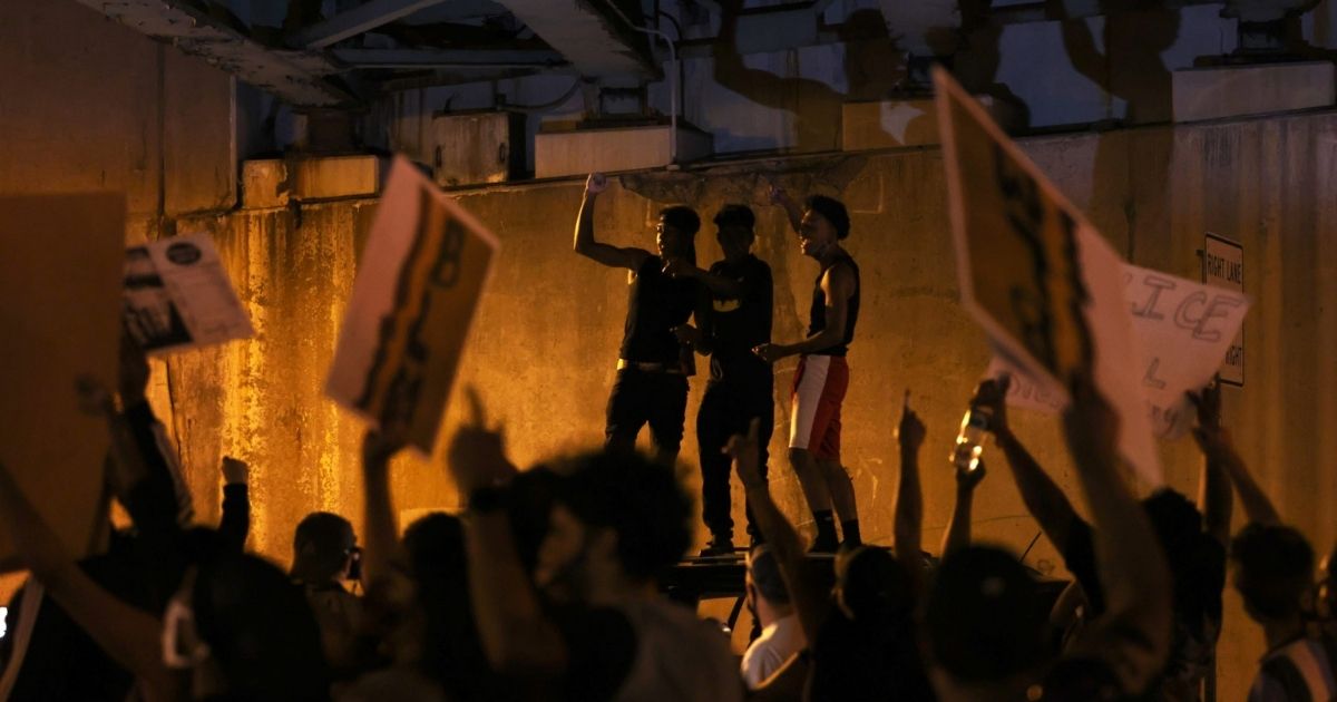 Demonstrators march toward the Rochester Police Station on Sept. 3, 2020, in Rochester, New York.