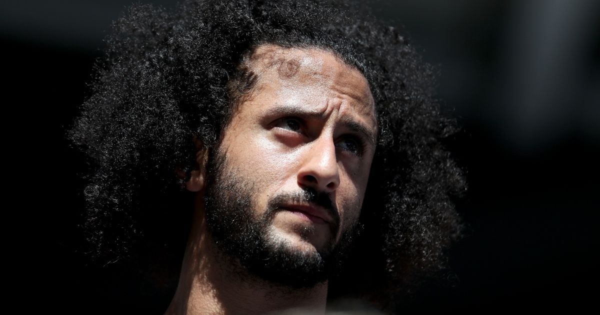 Former San Francisco 49er Colin Kaepernick watches a U.S. Open match at the USTA Billie Jean King National Tennis Center in the Queens borough of New York City on Aug. 29, 2019.