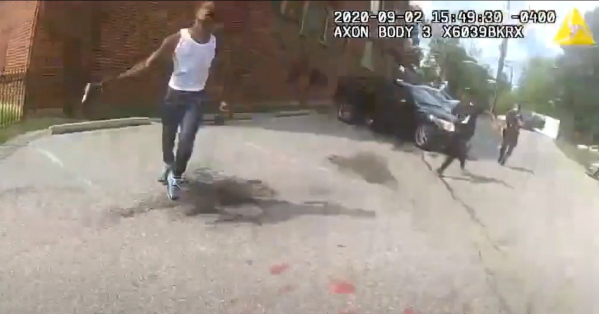 Deon Kay is seen with a handgun before he was shot by Washington, D.C., police officers.
