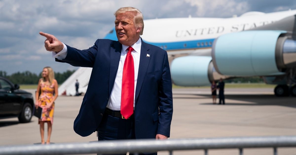President Donald Trump talks to a crowd of supporters after arriving at Wilmington International Airport on Sept. 2, 2020, in Wilmington, North Carolina.