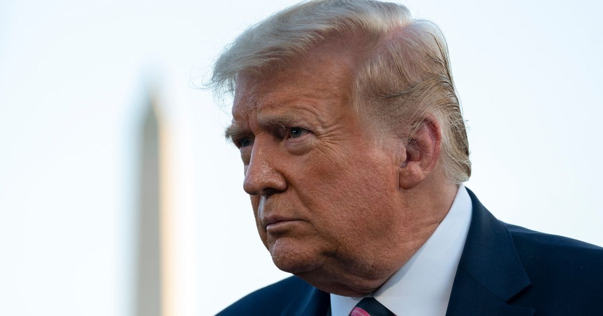 President Donald Trump stops and takes questions from reporters on his way to Marine One on the South Lawn of the White House on Sept. 22, 2020, in Washington, D.C.