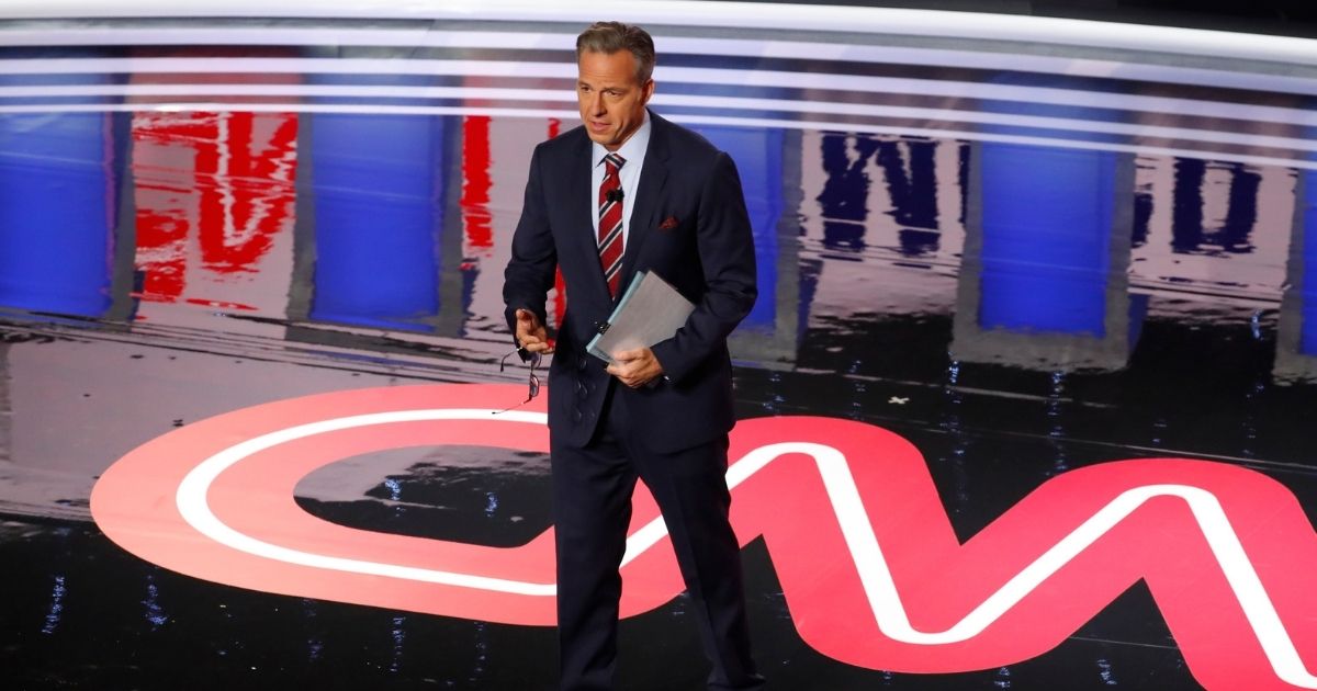 Jake Tapper speaks before the first of two Democratic presidential primary debates hosted by CNN Tuesday, July 30, 2019, in the Fox Theatre in Detroit.