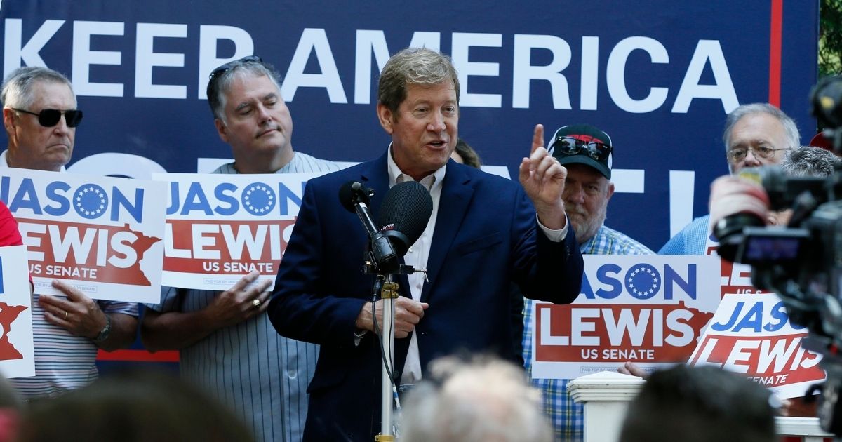 Republican and former U.S. Congressman Jason Lewis announces his run for a Senate seat in Minnesota on Aug. 22, 2019, at the State Fair in Falcon Heights, Minnesota.