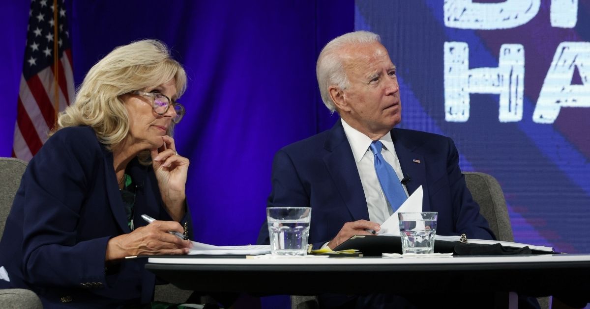 Democratic presidential nominee Joe Biden, right, and his wife Dr. Jill Biden receive a virtual briefing from experts on school reopening on Sept. 2, 2020, in Wilmington, Delaware.