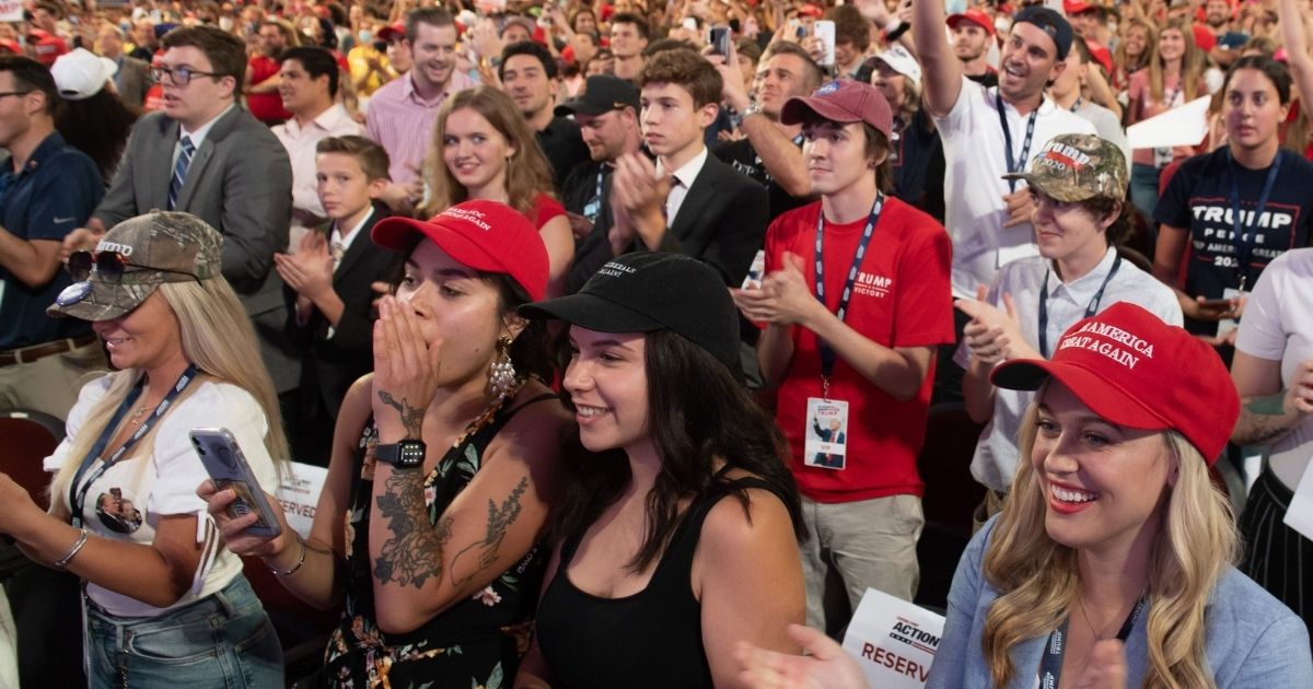 Students cheer as President Donald Trump speaks during a Students for Trump rally at the Dream City Church in Phoenix on June 23, 2020.