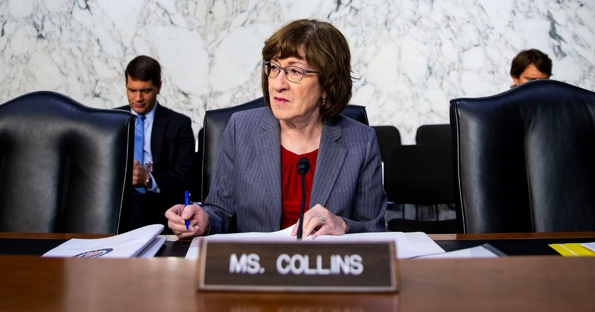 Republican Sen. Susan Collins of Maine arrives before retired Vice Adm. Joseph Maguire testifies during a Senate Intelligence Committee hearing to be confirmed as the director of the National Counterterrorism Center on July 25, 2018, on Capitol Hill in Washington, D.C.