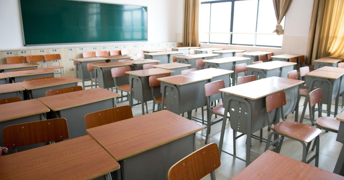 A stock image of a classroom is pictured above.