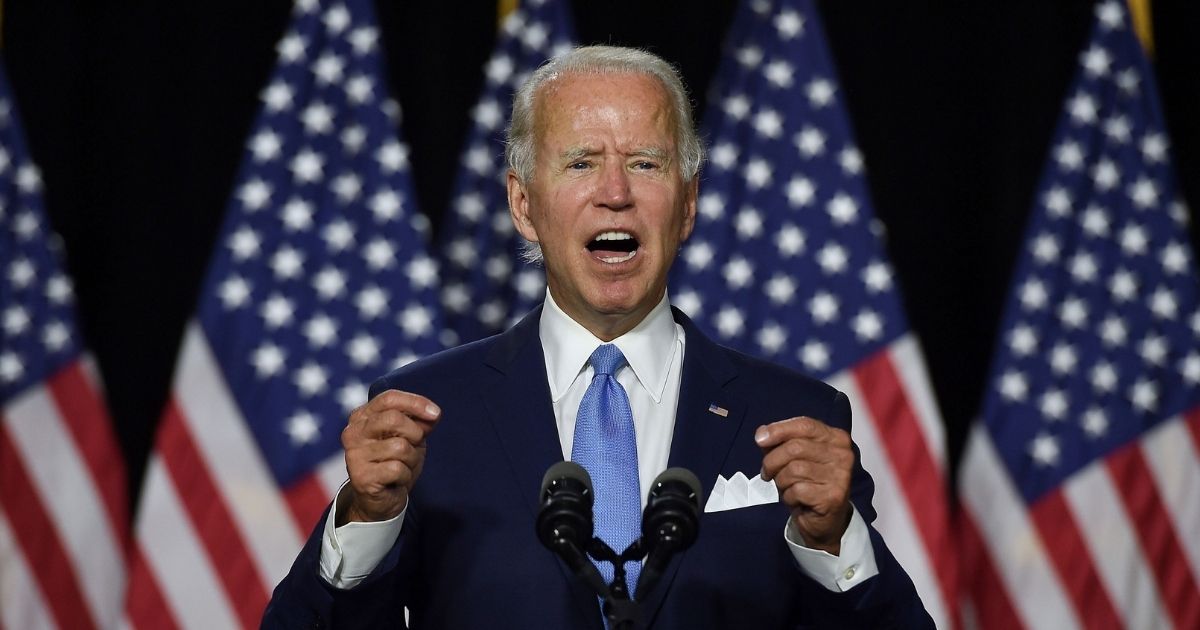 Democratic presidential nominee Joe Biden speaks before introducing his vice presidential running mate, California Sen. Kamala Harris, during their first news conference together in Wilmington, Delaware, on Aug. 12, 2020.