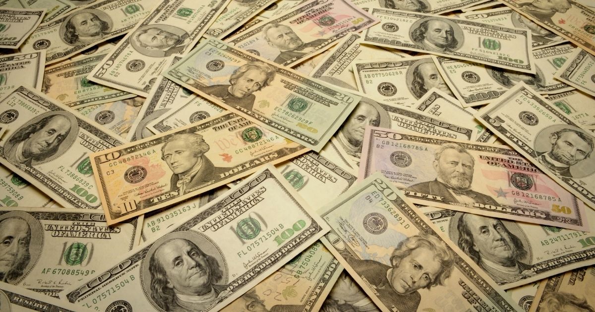 A pile of money is pictured in the stock image above.