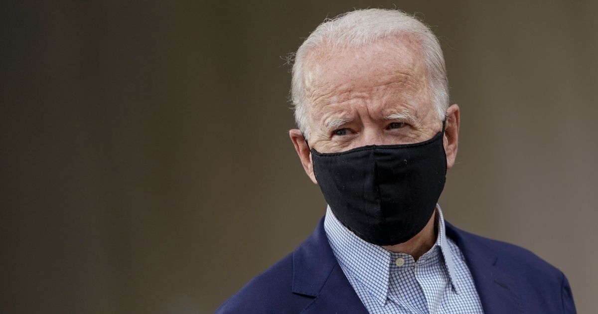 Democratic presidential nominee Joe Biden departs the Delaware State Building after early voting in the state's primary election on Sept. 14, 2020, in Wilmington, Delaware.