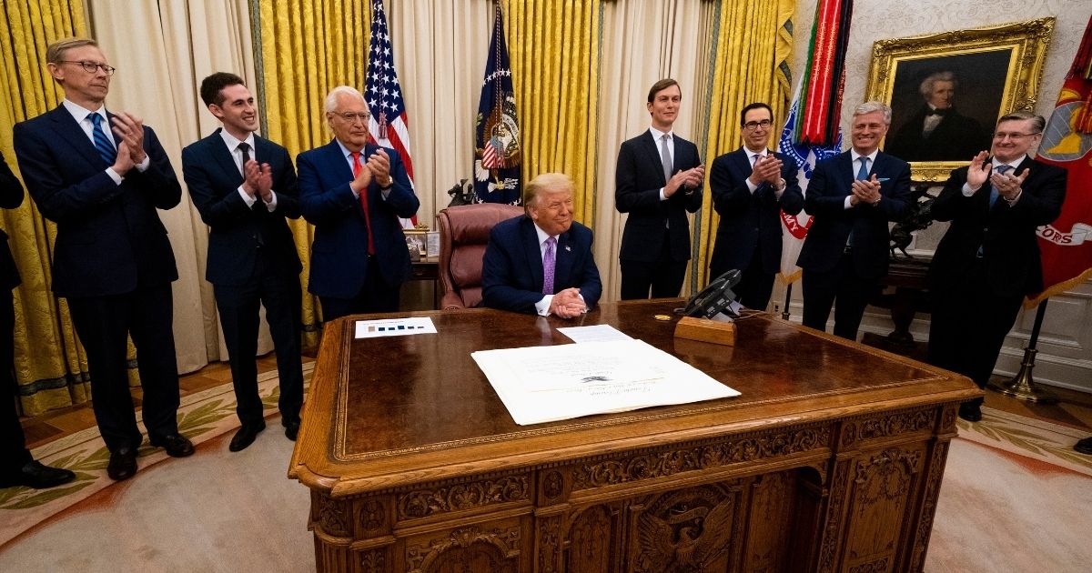WASHINGTON, DC - AUGUST 13: U.S. President Donald Trump leads a meeting with leaders of Israel and UAE announcing a peace agreement to establish diplomatic ties with Israel and the UAE, in the Oval Office of the White House on August 13, 2020 in Washington, DC. In a joint statement between Trump, Israeli Prime Minister Benjamin Netanyahu and Sheikh Mohammed Bin Zayed said the countries "agreed to the full normalization of relations between Israel and the United Arab Emirates."