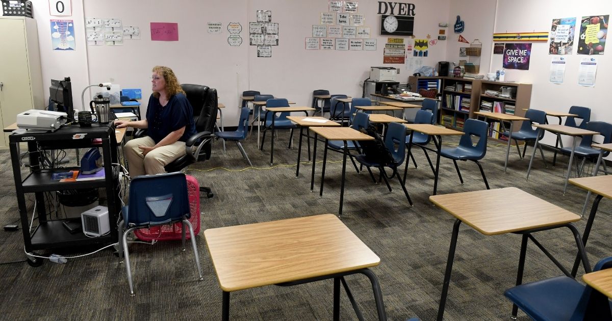 LAS VEGAS, NEVADA - AUGUST 24: Dana Dyer teaches an online seventh grade algebra class from her empty classroom at Walter Johnson Junior High School on the first day of distance learning for the Clark County School District amid the spread of the coronavirus (COVID-19) on August 24, 2020 in Las Vegas, Nevada. CCSD, the fifth-largest school district in the United States with more than 315,000 students, decided to start the school year with a full-time distance education instructional model as part of its Reopening Our Schools Plan due to health and safety concerns over the pandemic.