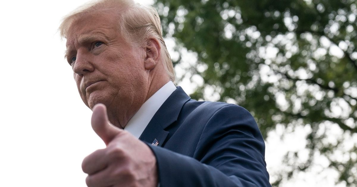 President Donald Trump gives a thumbs-up after speaking with reporters as he walks to Marine One on the South Lawn of the White House on Sept. 15, 2020, in Washington, D.C.