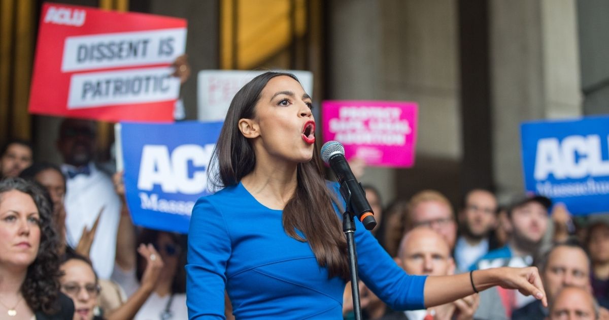 BOSTON, MA - OCTOBER 01: New York Congressional candidate Alexandria Ocasio-Cortez speaks at a rally calling on Sen. Jeff Flake (R-AZ) to reject Judge Brett Kavanaugh's nomination to the Supreme Court on October 1, 2018 in Boston, Massachusetts. Sen. Flake is scheduled to give a talk at the Forbes 30 under 30 event in Boston after recently calling for a one week pause in the confirmation process to give the FBI more time to investigate sexual assault allegations.